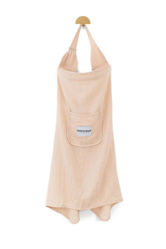 BreezyFeed nursing cover protecting baby from hot summer sun